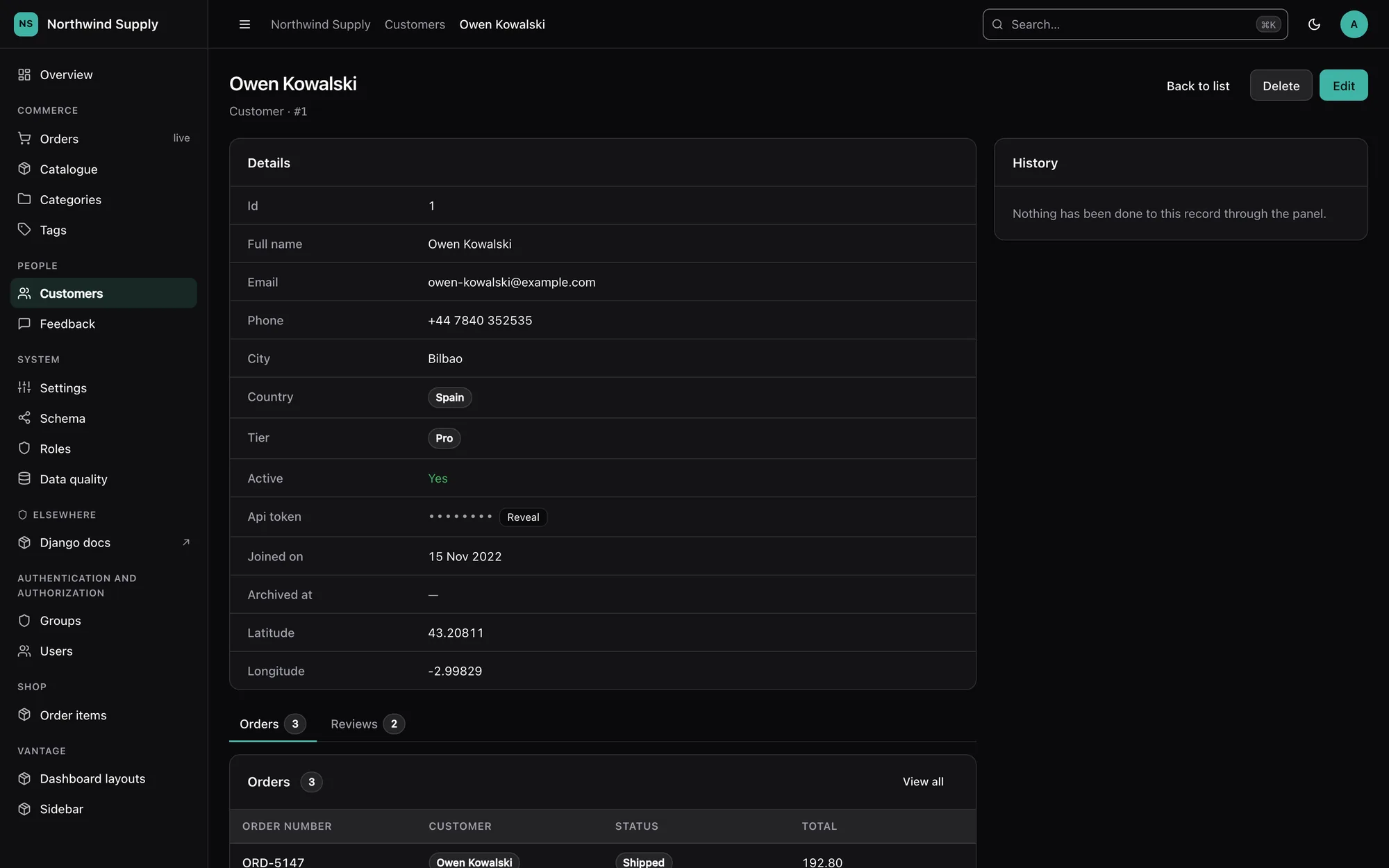 An API token masked with a Reveal button